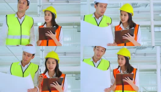 年轻的亚洲男女工程师戴着头盔走过建筑工地，为他们的项目制定计划，监督建筑工地高清在线视频素材下载