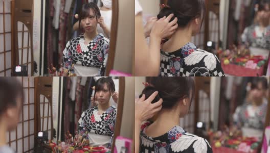 一位日本妇女在浴田的和服租赁店做头发高清在线视频素材下载