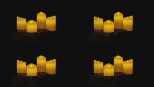 四支燃烧的蜡烛在降临节花环4。的出现高清在线视频素材下载