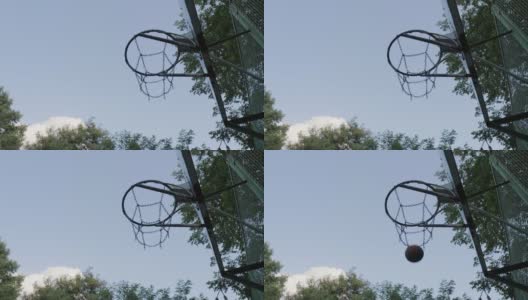 篮球穿过篮筐。街头篮球高清在线视频素材下载