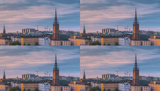 斯德哥尔摩,瑞典。天际线城市景观著名的古镇Gamla Stan在夏夜。著名的旅游景点，联合国教科文组织世界遗产。受欢迎的市政厅，Riddarholm教堂在日落高清在线视频素材下载