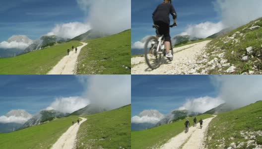 HD CRANE:骑在山路上的自行车手高清在线视频素材下载