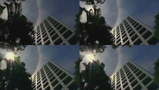 太阳光环彩虹高耸的摩天大楼和建筑高清在线视频素材下载