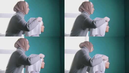 穆斯林女子系伊斯兰头巾的漂亮的新娘高清在线视频素材下载