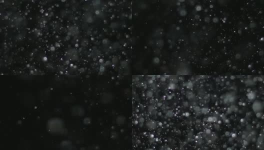 黑色背景上的慢动作雪高清在线视频素材下载