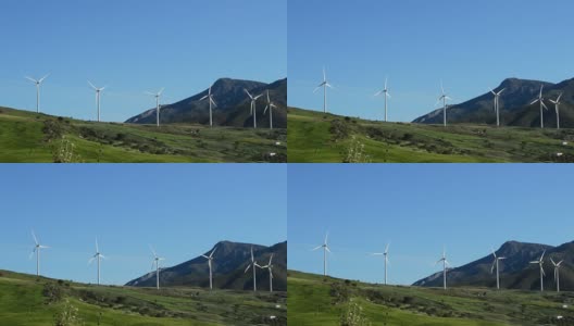 风力涡轮机的能量在山上移动高清在线视频素材下载