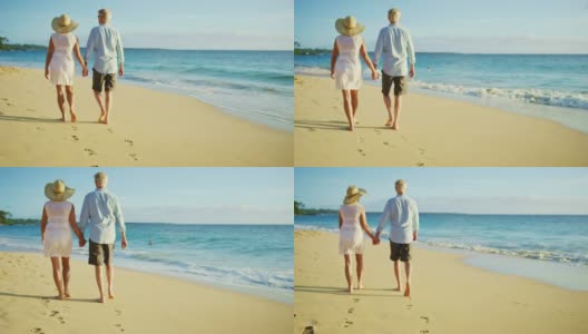 日落时分，在海滩上散步的幸福夫妇高清在线视频素材下载
