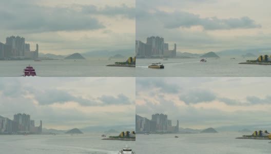 时光流逝阴云密布的维多利亚湾和香港的建筑物基础设施-维多利亚港与现代化的商业建筑外区城市高清在线视频素材下载