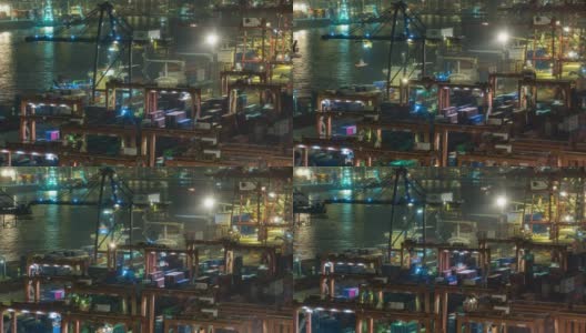4K延时:码头商埠的集装箱货物仓库和工作吊车桥在夜间装卸集装箱，用于商业物流、进出口、运输。高清在线视频素材下载