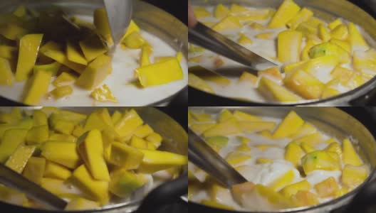 用甜椰奶制作南瓜。用勺子搅拌。自制来自泰国。缓慢的运动。高清在线视频素材下载