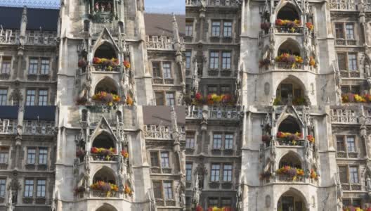德国慕尼黑——2019年10月25日:慕尼黑的新市政厅装饰着各种盛开的鲜花。马里恩广场，城市的中心广场高清在线视频素材下载