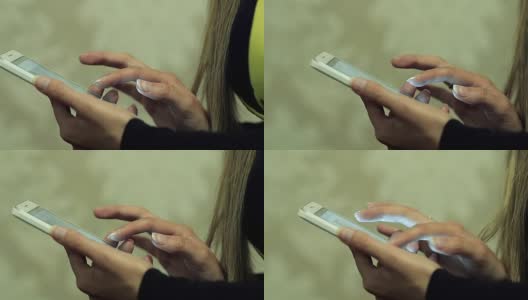 多莉特写一个年轻女孩使用智能手机的美丽的手高清在线视频素材下载