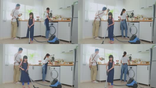 亚洲漂亮的父母教年轻的女孩打扫家里的厨房。可爱的爸爸妈妈帮助和支持小女儿在家打扫房间的地板。活动关系的概念。高清在线视频素材下载