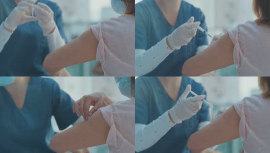 一段4k视频显示，一名不认识的护士在诊所给她的病人注射新冠疫苗高清在线视频素材下载