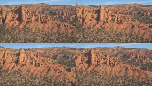 航拍:犹他州布赖斯峡谷令人惊叹的红色岩石hoodoos和砂岩悬崖高清在线视频素材下载