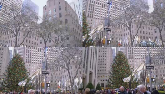 摇摄洛克菲勒中心的圣诞树和一大群游客的视频高清在线视频素材下载