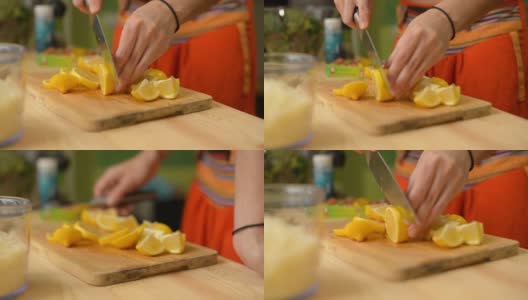 特写:女孩在木板上切柠檬高清在线视频素材下载