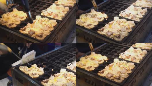 芝士球形鱿鱼小吃在街头市场烹饪高清在线视频素材下载