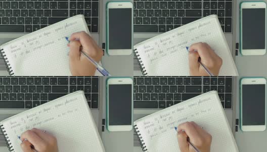 女人的手用钢笔在纸笔记本上做笔记高清在线视频素材下载