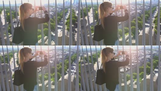 巴黎的一名女子从空中拍摄这座城市高清在线视频素材下载