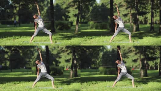女人在公园里练习瑜伽高清在线视频素材下载