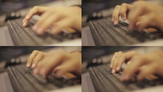 在台式电脑或电脑上工作时，用手在键盘上打字。高清在线视频素材下载