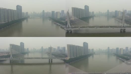 雾霾中的广州大桥，车流和城市景观。中国鸟瞰图高清在线视频素材下载