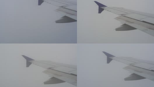 飞机乘机穿越恶劣天气的阴雨云层高清在线视频素材下载