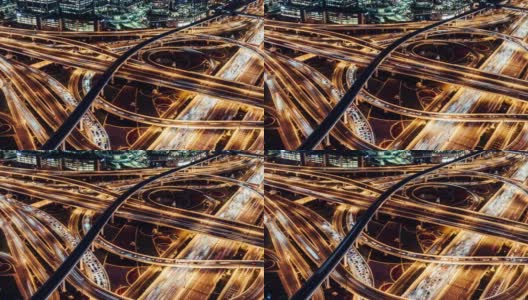 T/L TD天桥鸟瞰图，地铁和城市交通在晚上/阿联酋迪拜高清在线视频素材下载