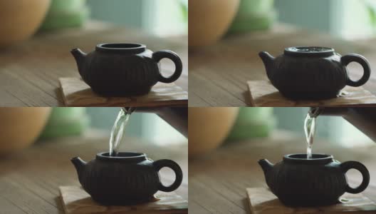 往中式茶壶里倒热水高清在线视频素材下载