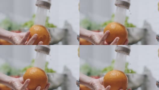 慢动作特写手洗橙果高清在线视频素材下载