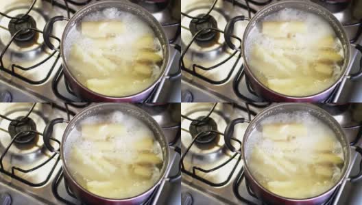 美味的木薯在平底锅中烹饪高清在线视频素材下载
