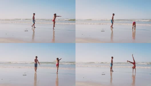 男孩和女孩一起在海滩上玩暑假高清在线视频素材下载