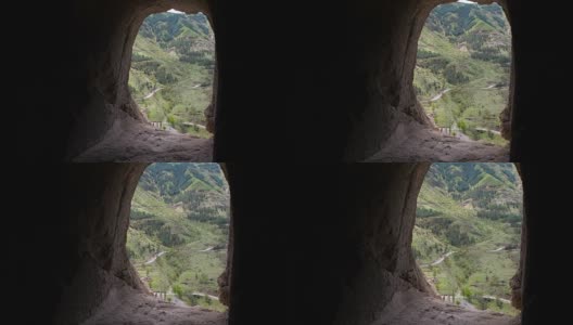 观景从洞洞瓦尔齐亚洞修道院。复杂的岩石雕刻。山里的山洞小镇高清在线视频素材下载