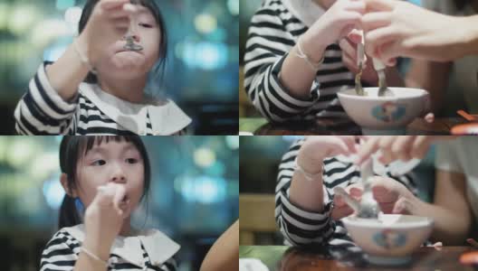 小女孩(4-5岁)吃东西高清在线视频素材下载
