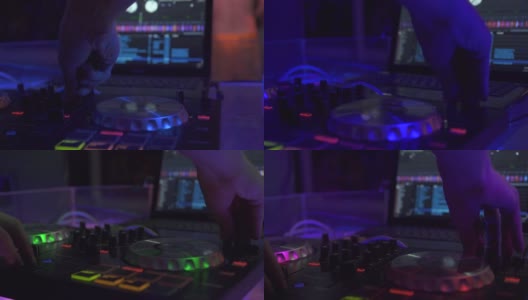 DJ控制台混合舞曲和笔记本电脑在迪斯科俱乐部。DJ混音播放器和音响控制台为舞会。近距离的唱片骑师控制器与音乐均衡器在夜总会混音甲板上高清在线视频素材下载