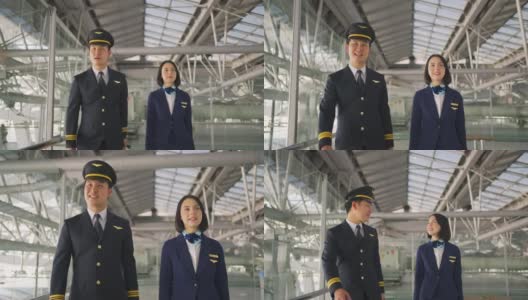 亚洲客机的飞行员和空姐在机场候机楼边走边聊，面带微笑，幸福地走向飞机。商务舱乘务人员或空姐和飞行员的职业概念。高清在线视频素材下载