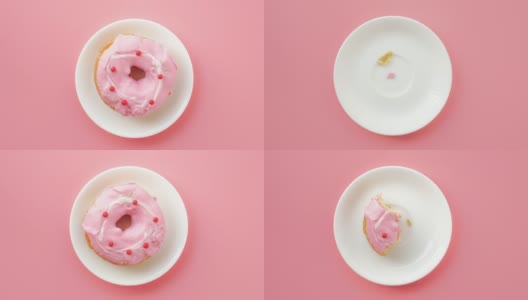 定格动画甜甜圈咬粉红色的背景高清在线视频素材下载