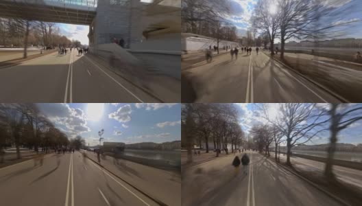早春漫步在城市公园的堤岸与360度动作摄像头，时间推移，hyperlapse高清在线视频素材下载