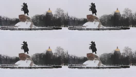 俄罗斯圣彼得堡，冬天，以圣以撒大教堂为背景的彼得大帝纪念碑高清在线视频素材下载