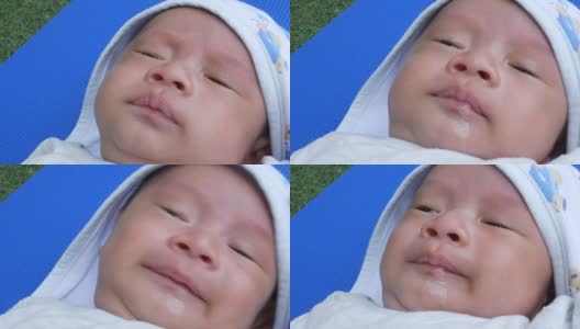 面部表情由婴儿新生儿，呕吐牛奶高清在线视频素材下载
