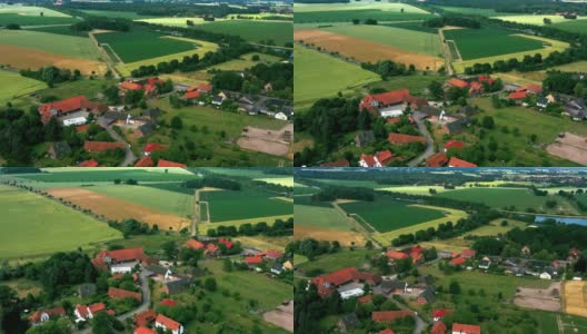 德国北部小村庄中心鸟瞰图，有农场、农舍、半木质房屋和传统民居高清在线视频素材下载