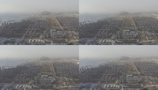 一个大型城市建筑群的施工现场的航拍视频高清在线视频素材下载