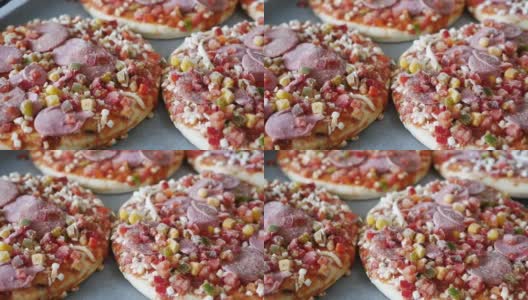 烤盘里的冷冻披萨，即食披萨，冷冻食品，高清在线视频素材下载
