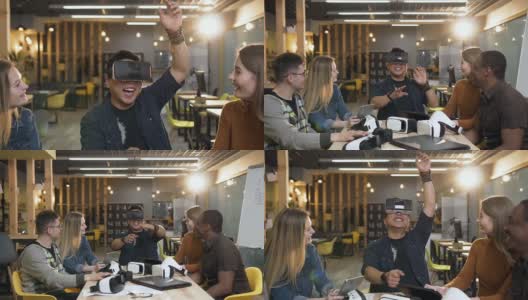 一群潮人看着年轻的中国男子戴着虚拟现实眼镜玩游戏，嘲笑他高清在线视频素材下载