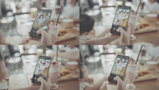 一个女人在咖啡店用智能手机拍照高清在线视频素材下载