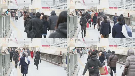 高清慢镜头:行人、通勤者、人群在大阪站步行高清在线视频素材下载