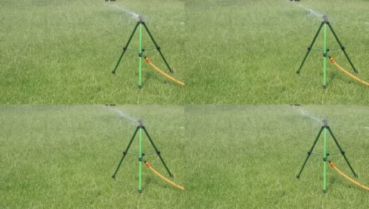 sprinkler在白天给公园草坪浇水高清在线视频素材下载