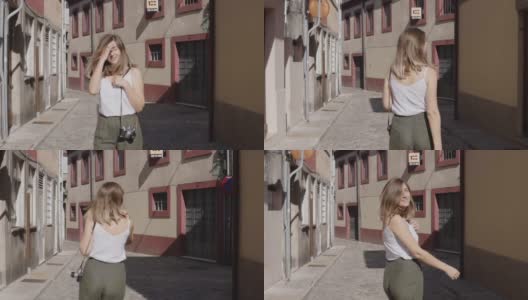 年轻女子走在老城，葡萄牙高清在线视频素材下载
