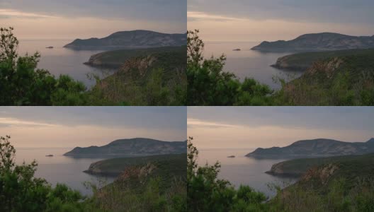 科西嘉岛的海岸线有遥远的海滩和美丽的水晶清澈的水在日落高清在线视频素材下载